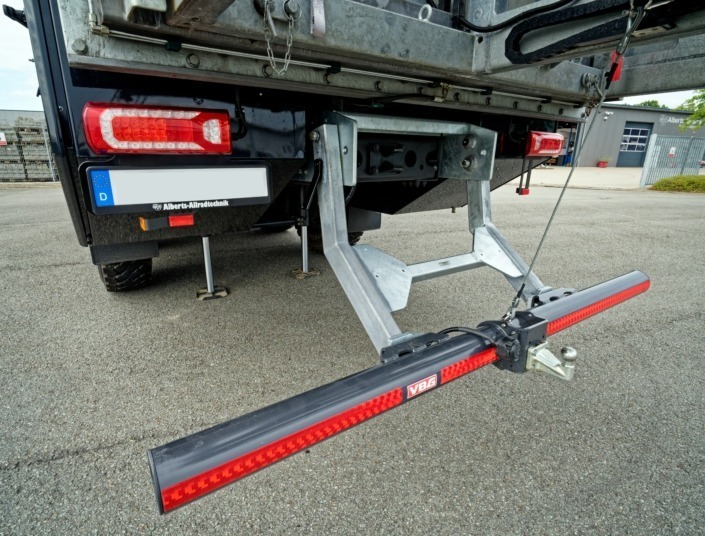 Folding VBG underrun protection with trailer hitch installed on the expedition vehicle