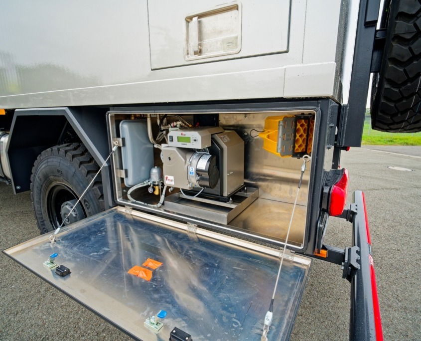 Expedition vehicle Alberts 60UQX heater in storage box